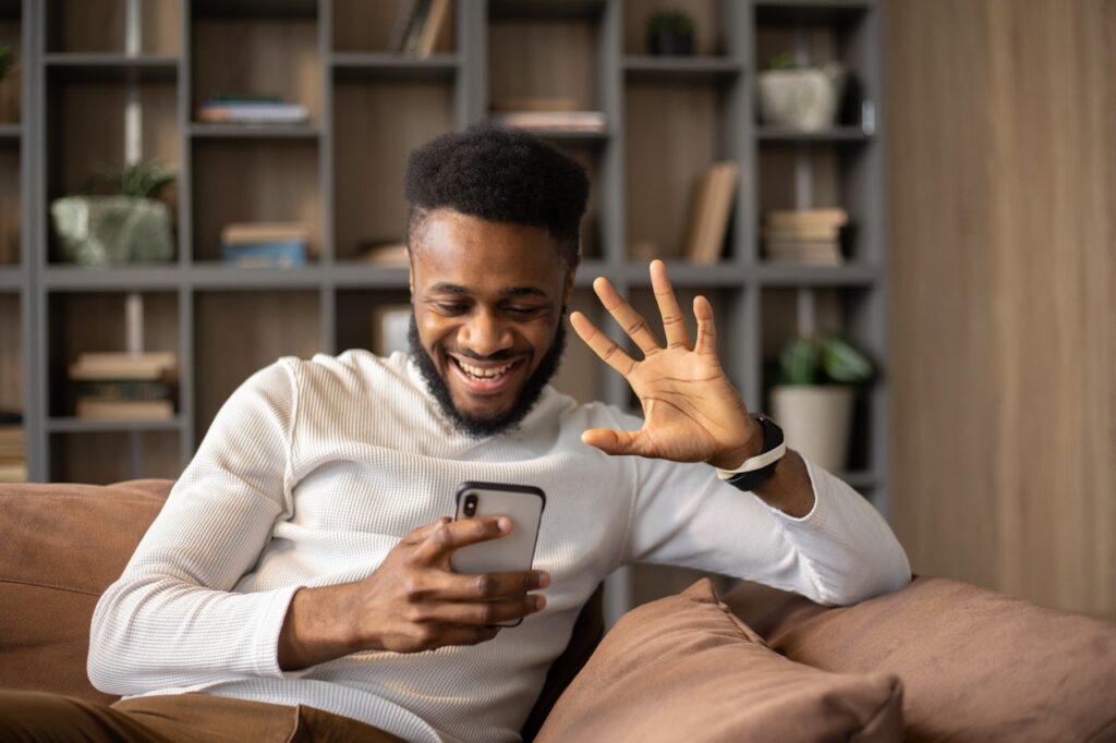 man searching on mobile phone